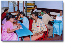 Pictures of SEEK Camp organized by CKF and Care and Share registration, questionnaire being filled up.