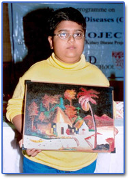 Justine, a renal transplant patient with the painting he had drawn. This was auctioned in CKF meeting for INRS 10000.