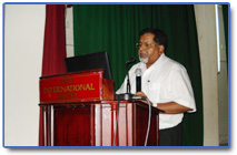 Dr. Georgy K. Nainan taking a class on  the medical aspects of  transplantation